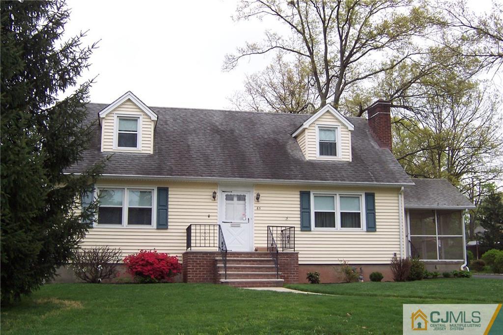 65 East Cliff Road Colonia, NJ 07067 - Photo 25 of 25 a front view of a house with a garden