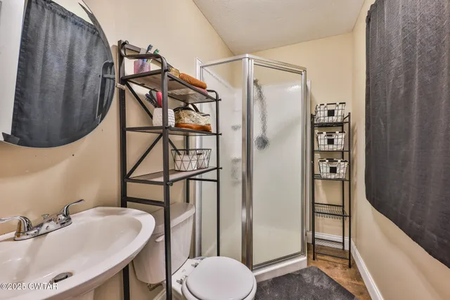 a bedroom with bed and window