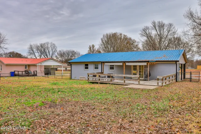 a house with trees in front of it