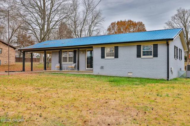 a view of backyard of house