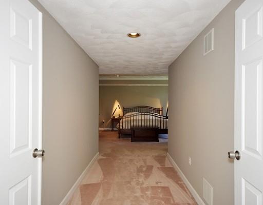 2 Conifer Hill Road Chelmsford, MA 01824 - Photo 20 of 32 a bedroom with a bed and a window