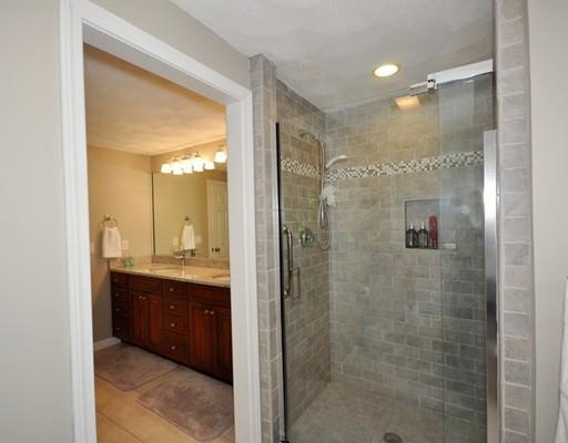 2 Conifer Hill Road Chelmsford, MA 01824 - Photo 24 of 32 a bathroom with a granite countertop sink mirror and shower