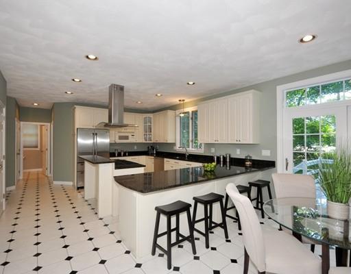 2 Conifer Hill Road Chelmsford, MA 01824 - Photo 5 of 32 a kitchen with stainless steel appliances granite countertop a sink a stove and a refrigerator