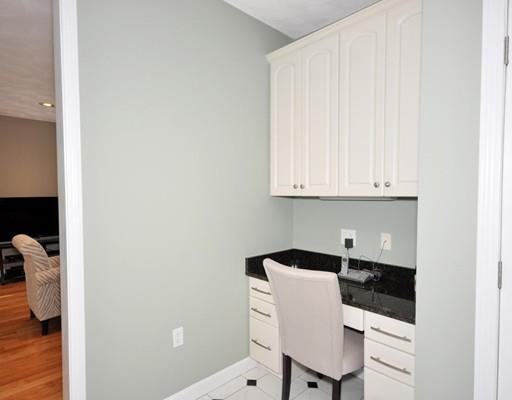 2 Conifer Hill Road Chelmsford, MA 01824 - Photo 10 of 32 a kitchen with a sink and cabinets