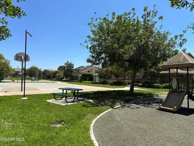 a park view with a bench
