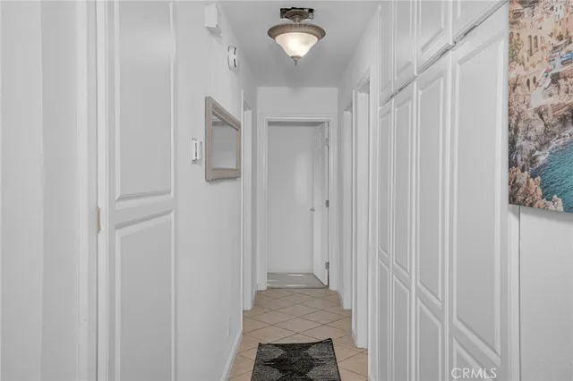 a view of a hallway with a white walls