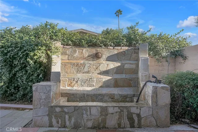 a view of a bench in the patio