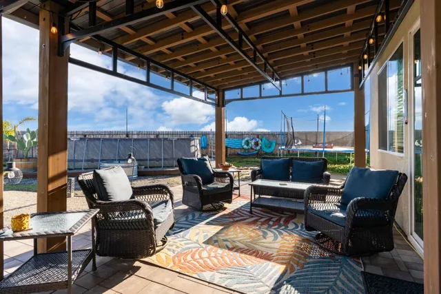 a outdoor living space with patio furniture