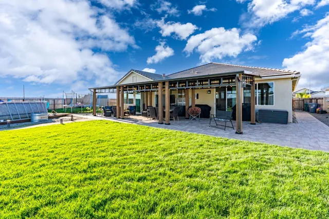 a view of a house with a swimming pool