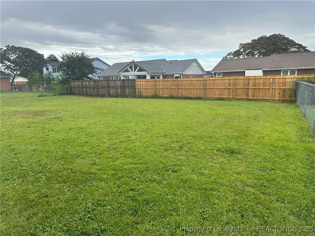 a view of outdoor space and yard