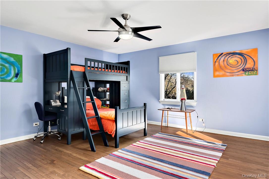 106 Old Stone Hill Road Pound Ridge, NY 10576 - Photo 16 of 25 a bedroom with furniture and a window