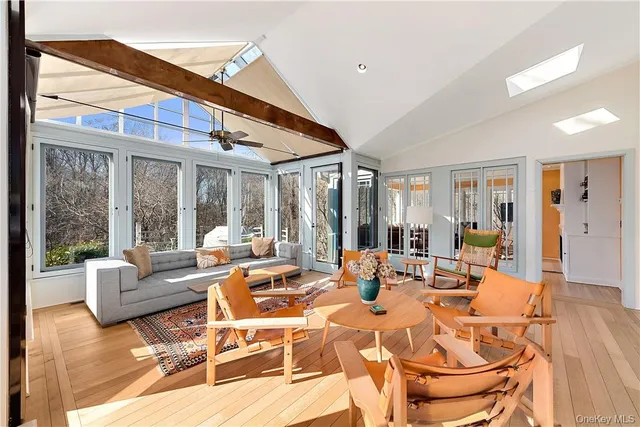 a outdoor space with patio the couches and dining table with balcony view