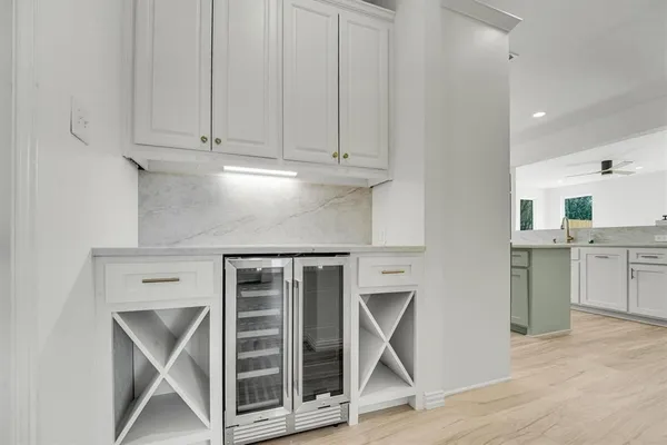 a utility room with cabinets