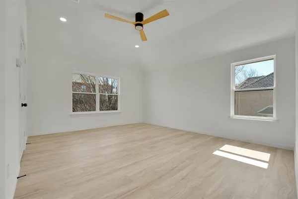 an empty room with windows