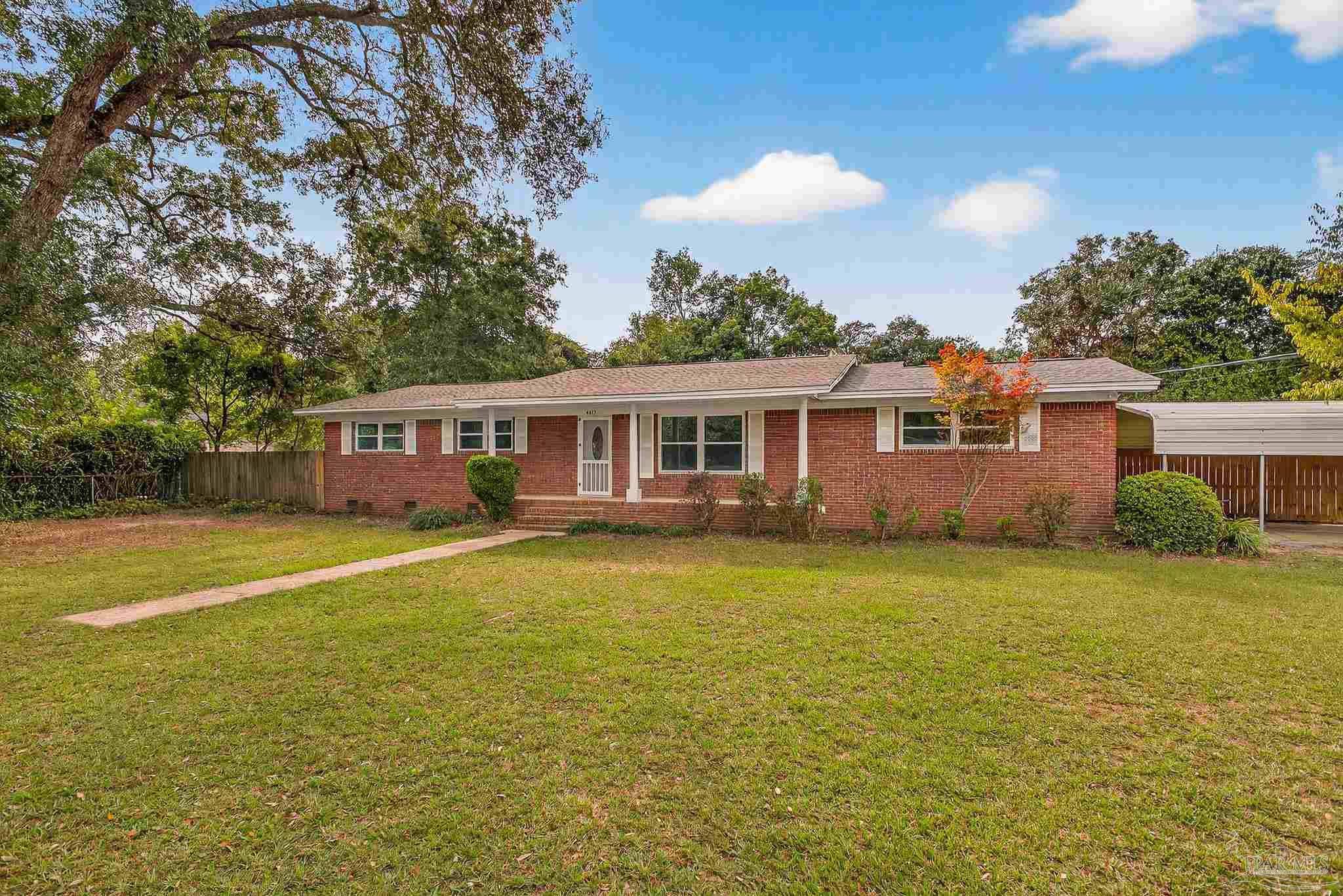4673 Van Horn Road Milton, FL 32583 - Photo 3 of 53 a view of a house with a backyard