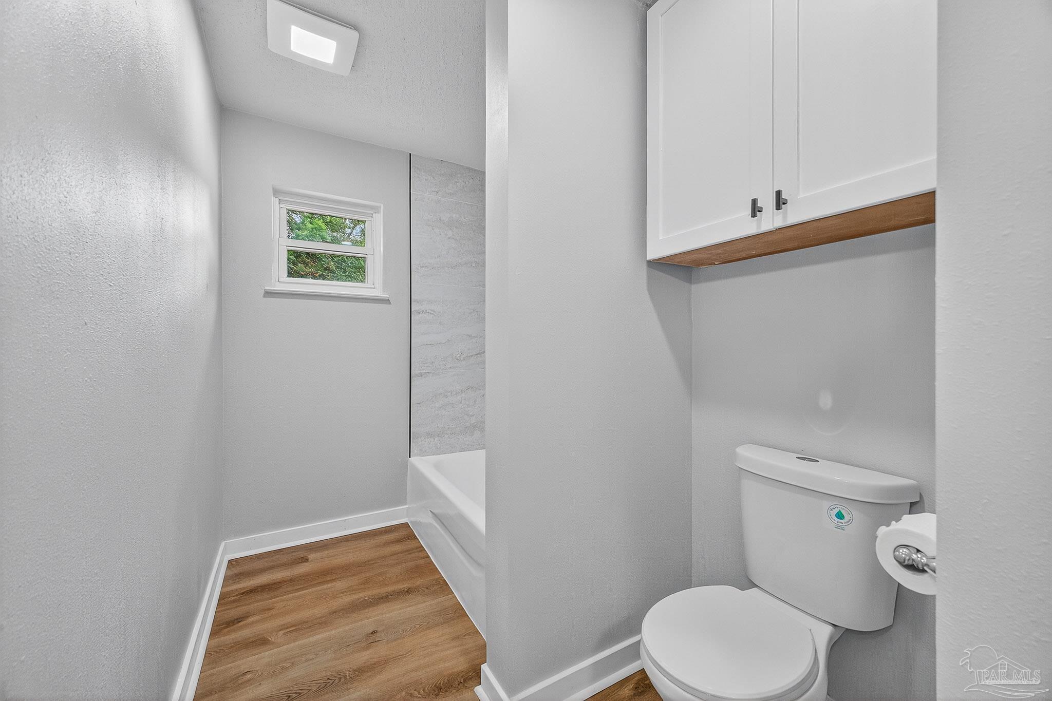 4673 Van Horn Road Milton, FL 32583 - Photo 34 of 53 a bathroom with a toilet