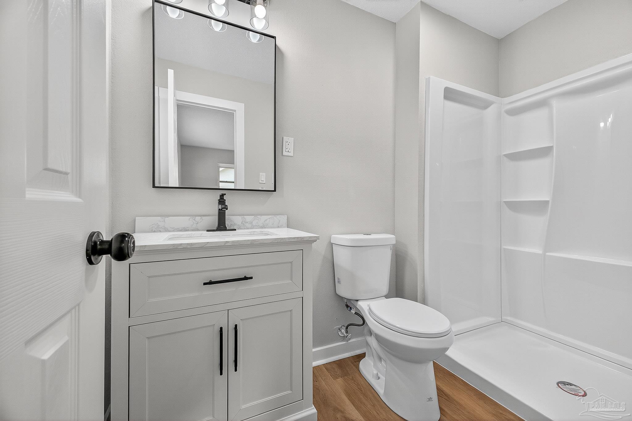 4673 Van Horn Road Milton, FL 32583 - Photo 43 of 53 a bathroom with a sink toilet and shower