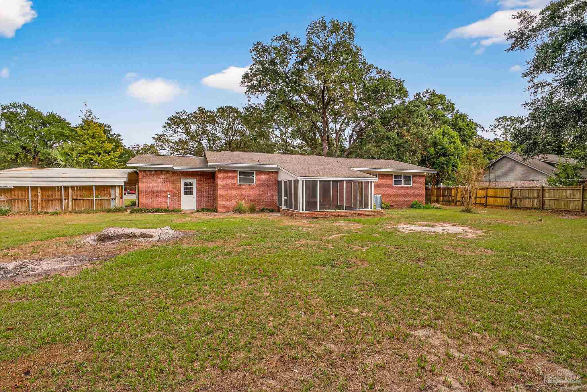 4673 Van Horn Road Milton, FL 32583 - Photo 51 of 53 a front view of house with yard and lake view