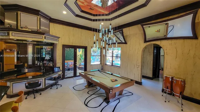 a view of swimming pool with outdoor seating