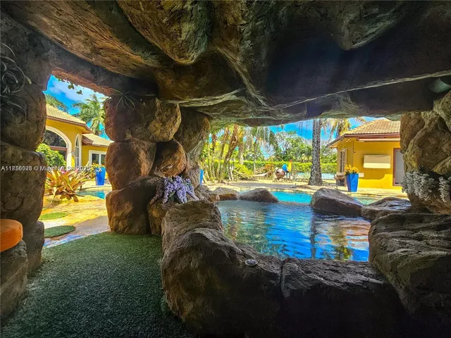 a view of a hallway with interior of the living room