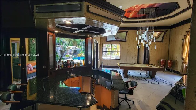 a living room with fireplace furniture and a flat screen tv