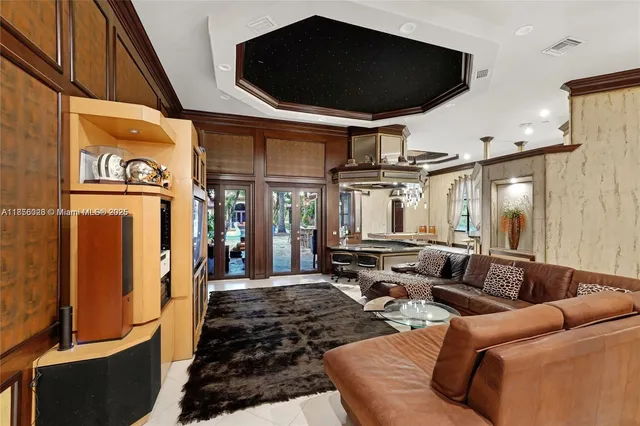 a bedroom with bed and wooden floor