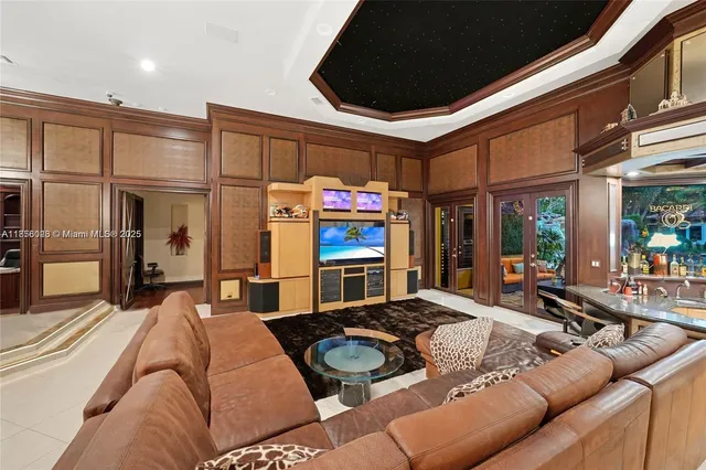 a man walking down a street next to a building