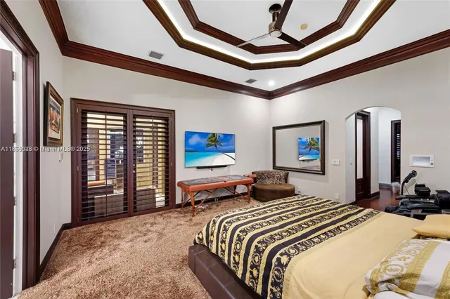 a view of an outdoor dining space with a table and chairs