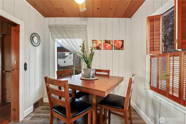 a large kitchen with a stove and a sink