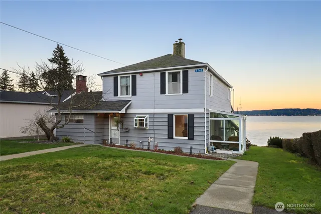 a front view of house with yard