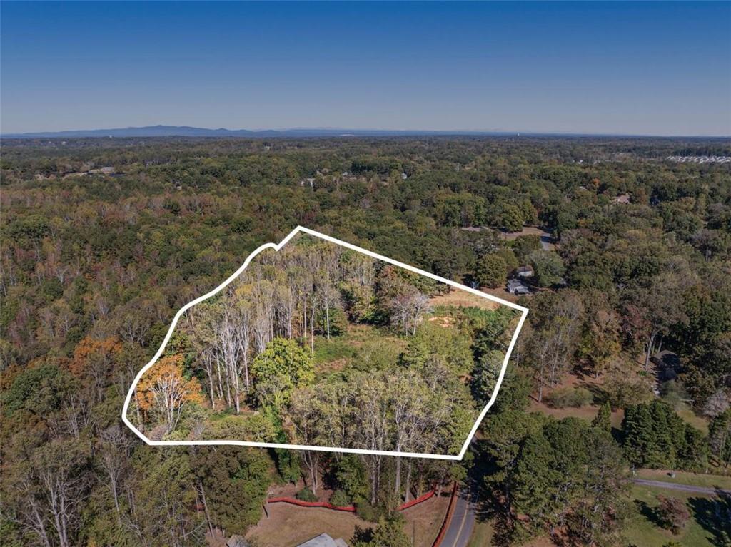 16662 Phillips Road Milton, GA 30004 - Photo 16 of 17 a view of a swimming pool with a balcony