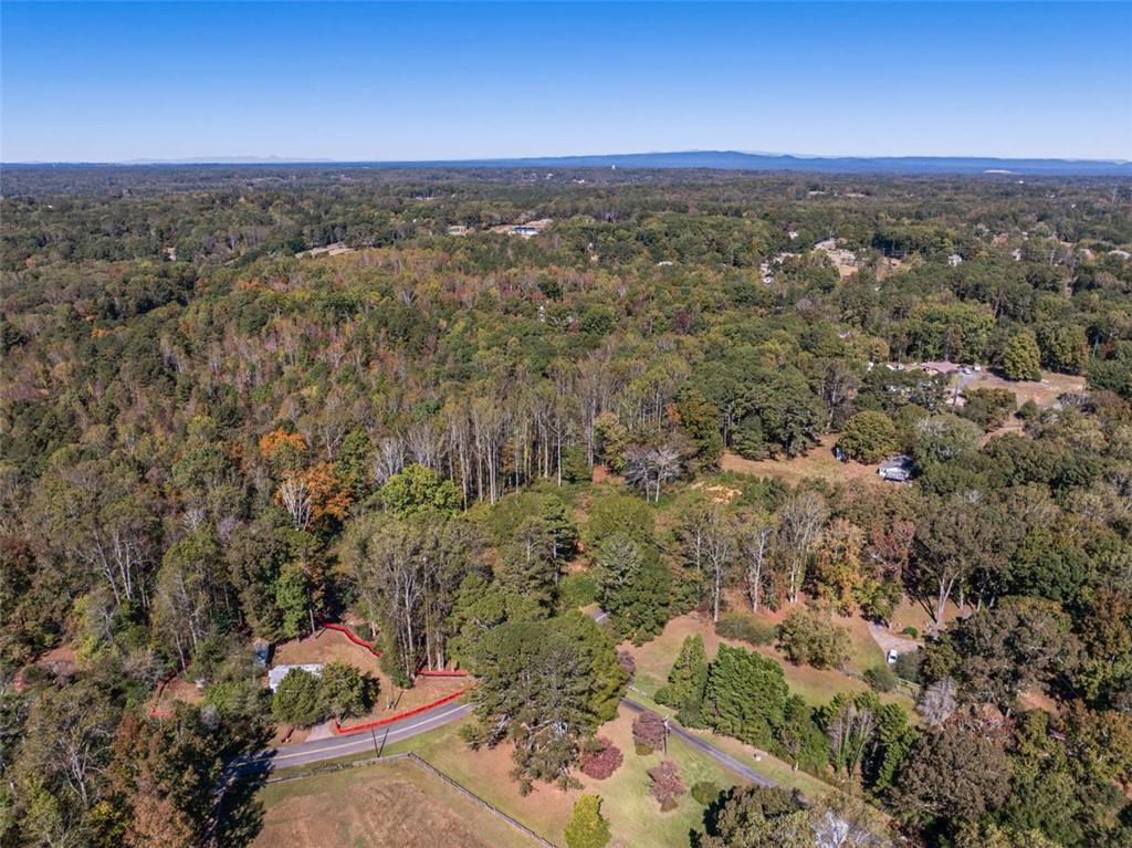 16662 Phillips Road Milton, GA 30004 - Photo 4 of 17 an aerial view of a house with a yard
