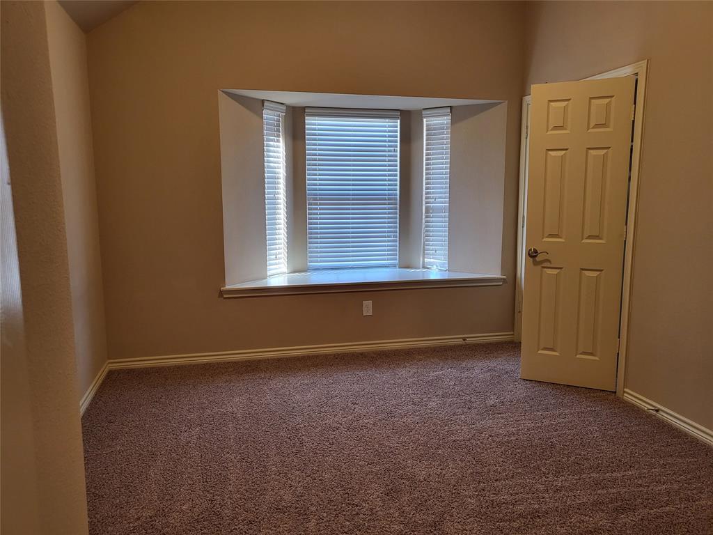 333 Cave River Drive Murphy, TX 75094 - Photo 20 of 26 a view of an empty room with a window