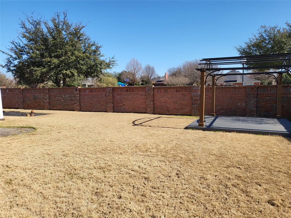 333 Cave River Drive Murphy, TX 75094 - Photo 4 of 26 a swimming pool with a yard