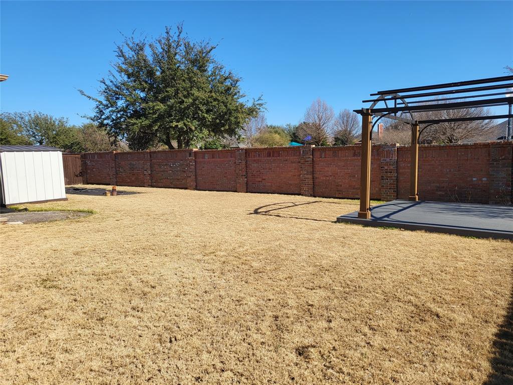 333 Cave River Drive Murphy, TX 75094 - Photo 5 of 26 a backyard of a house