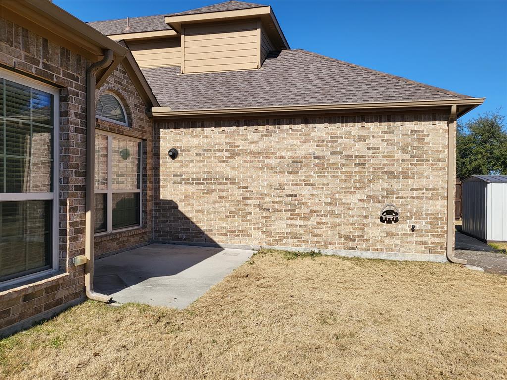 333 Cave River Drive Murphy, TX 75094 - Photo 6 of 26 a front view of a house with a yard