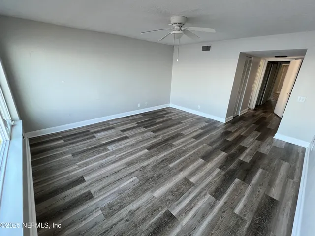 a view of a balcony with an ocean view