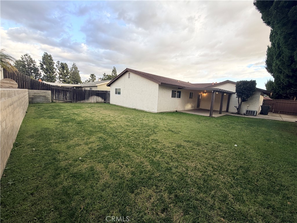 9668 Hemlock Street Rancho Cucamonga, CA 91730 - Photo 21 of 23 a view of a house with a yard and sitting area