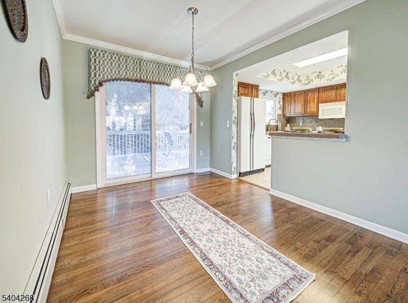 15 Patton Street High Bridge, NJ 08829 - Photo 11 of 46 a view of an empty room with glass door and wooden floor