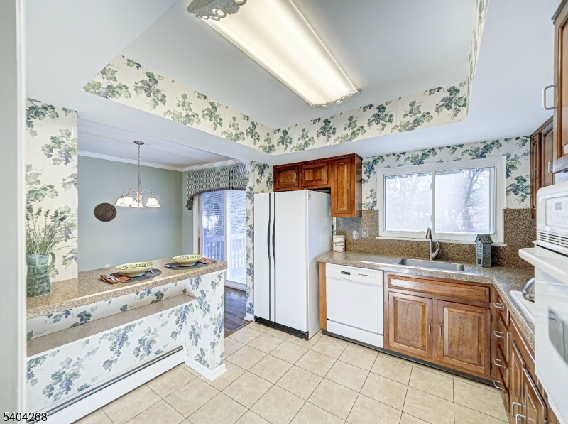 15 Patton Street High Bridge, NJ 08829 - Photo 16 of 46 a kitchen with a stove a sink and a refrigerator