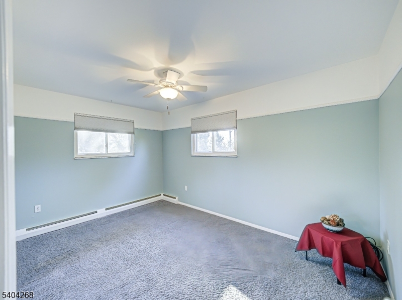 15 Patton Street High Bridge, NJ 08829 - Photo 21 of 46 a view of room with window and a ceiling fan