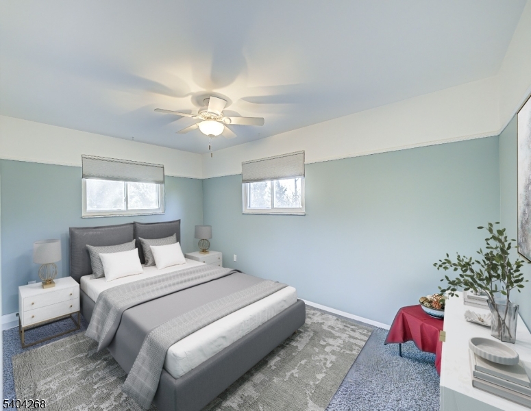15 Patton Street High Bridge, NJ 08829 - Photo 22 of 46 a bedroom with a bed and a chandelier