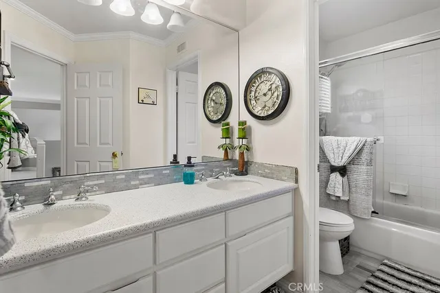 a bathroom with a toilet a sink and a bathtub