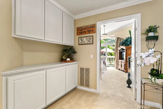 a hallway with cabinets