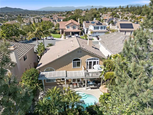an aerial view of a house with a garden view