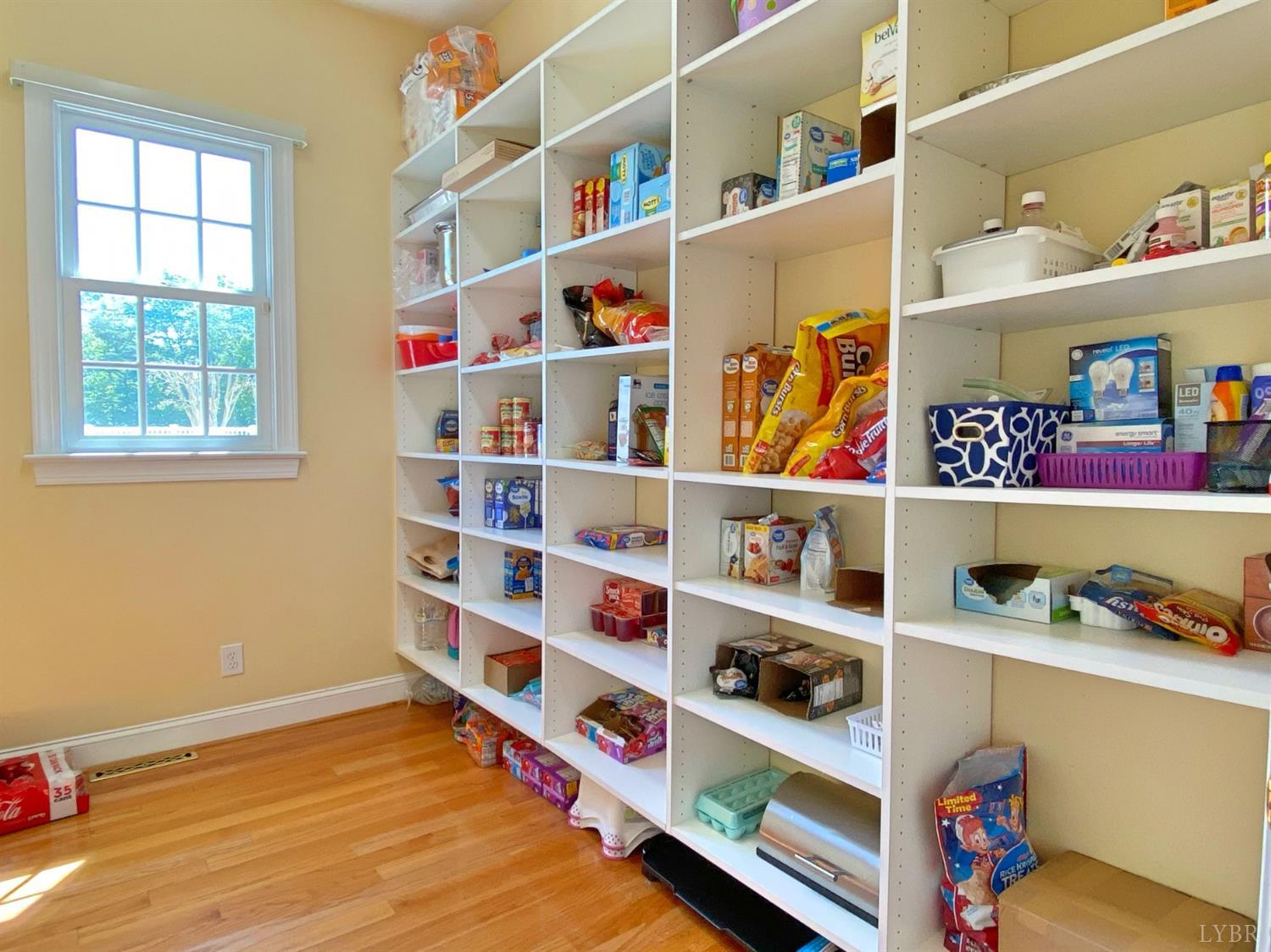 798 High Peak Road Monroe, VA 24574 - Photo 33 of 96 a room with a book shelf and a window