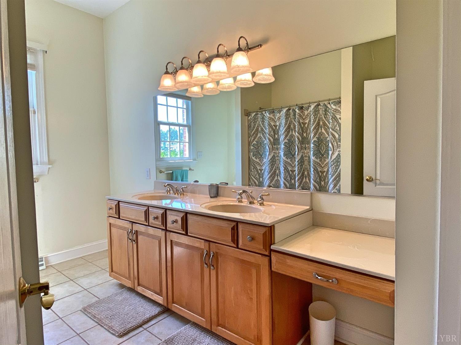 798 High Peak Road Monroe, VA 24574 - Photo 35 of 96 a bathroom with a sink and a mirror