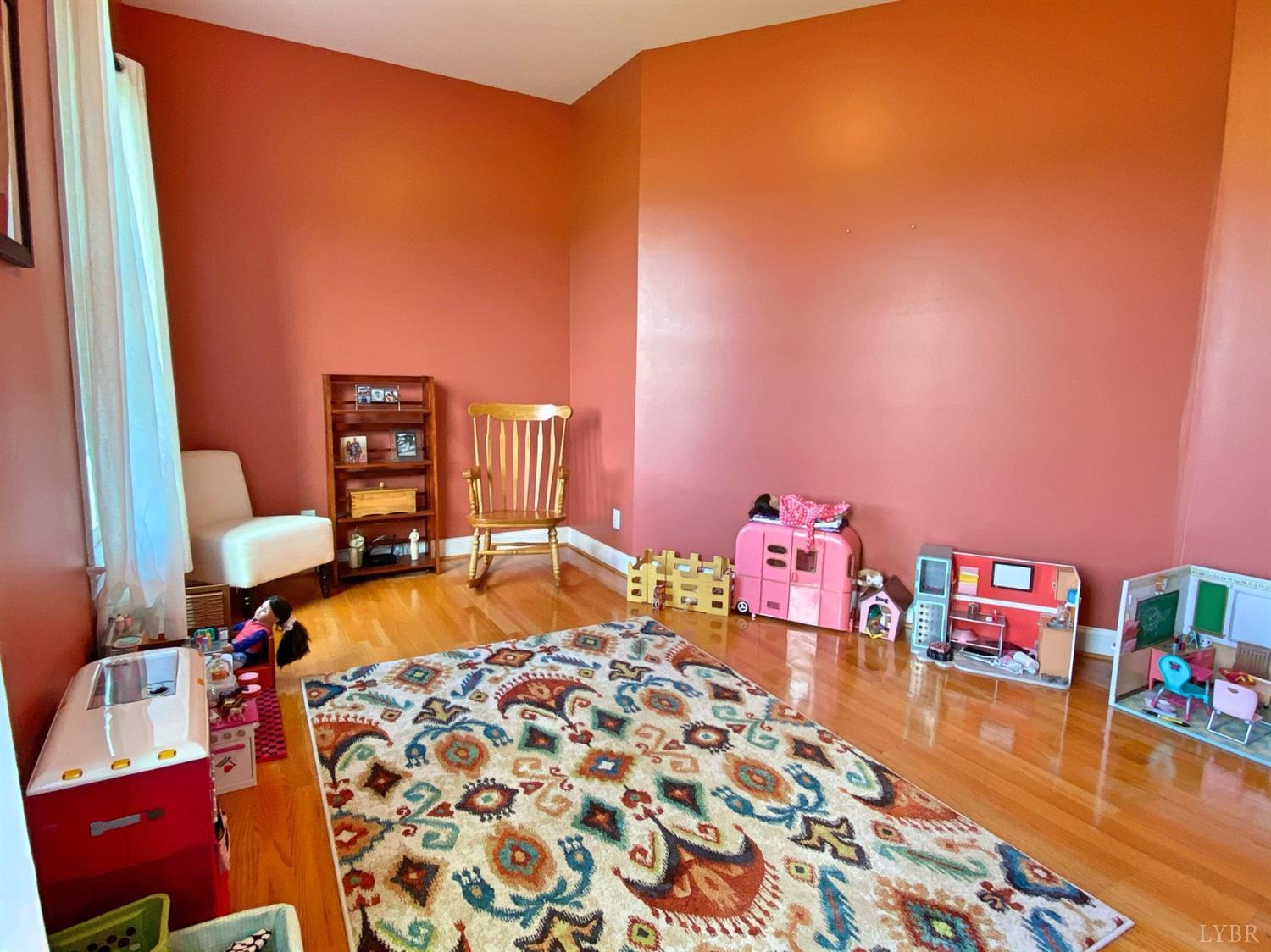 798 High Peak Road Monroe, VA 24574 - Photo 36 of 96 a bedroom with bed and wooden floor