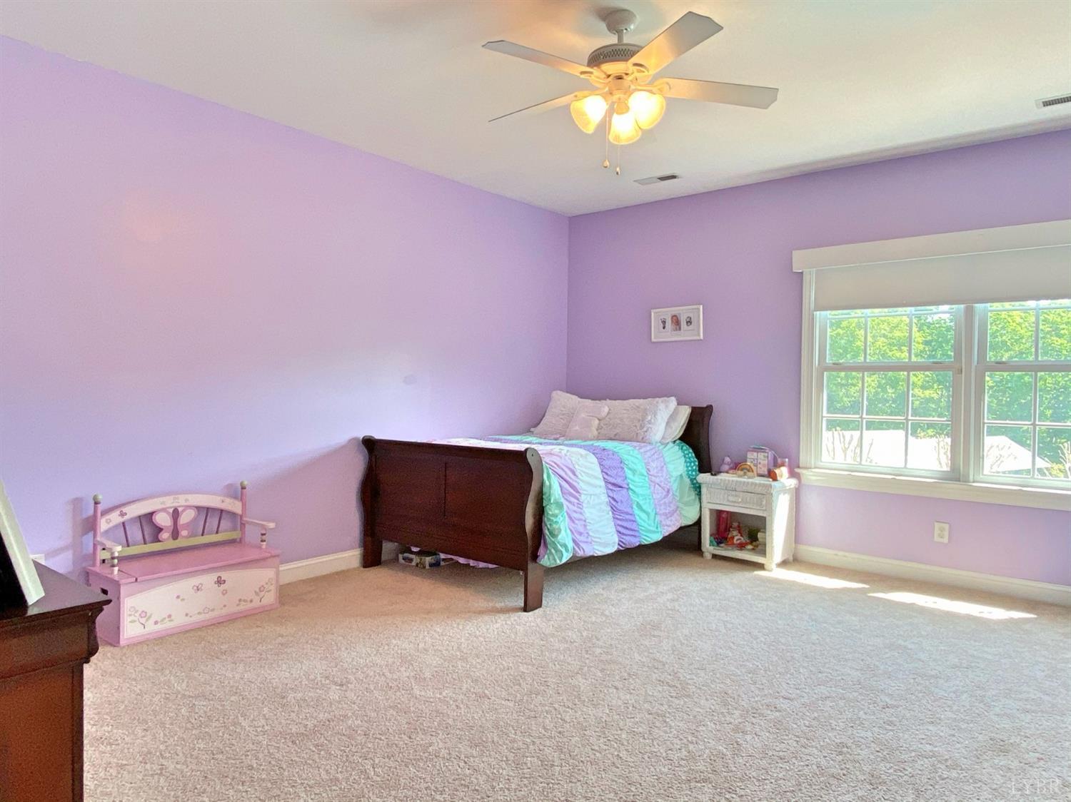 798 High Peak Road Monroe, VA 24574 - Photo 57 of 96 a bedroom with a bed and a window