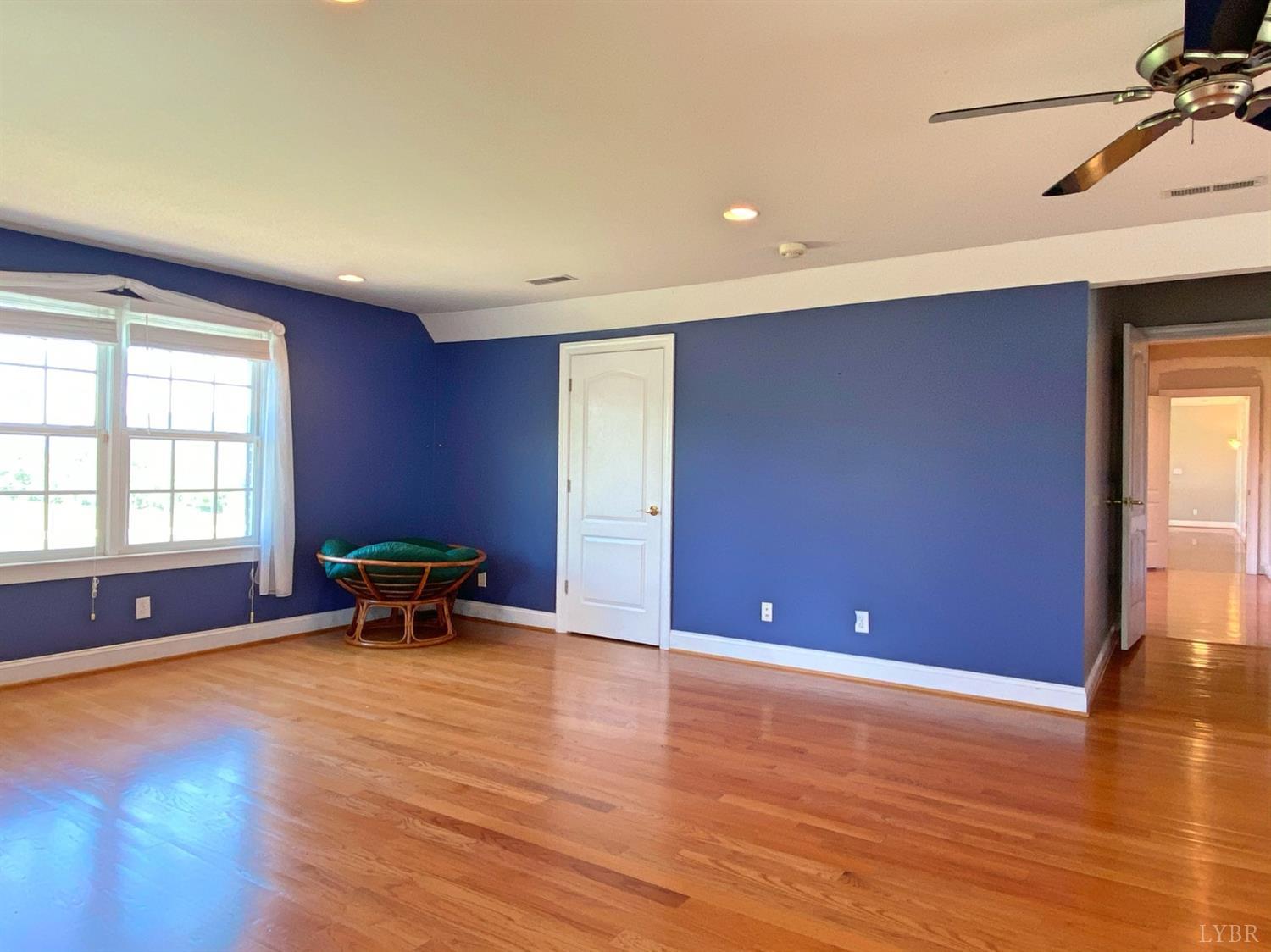 798 High Peak Road Monroe, VA 24574 - Photo 68 of 96 a view of an empty room with wooden floor and a window